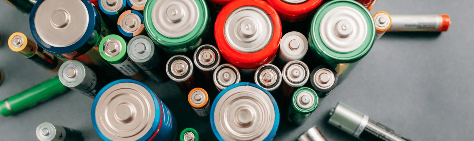 A pile of assorted batteries of different sizes