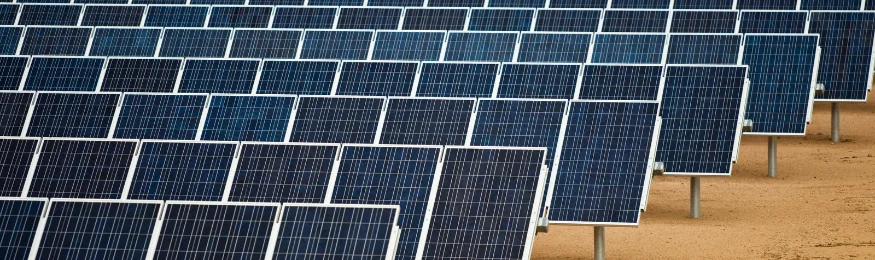 Rows of ground-mounted solar panels