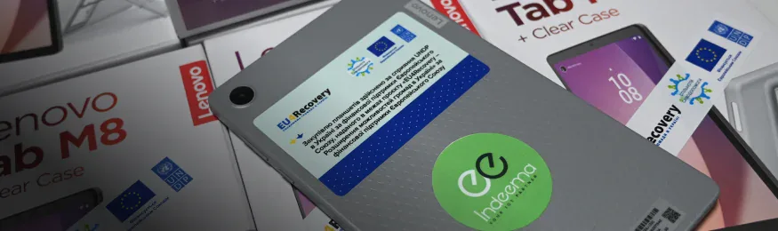 Lenovo tablet with an Indeema sticker and EU4Recovery label on top of boxed Lenovo Tab M8 tablets