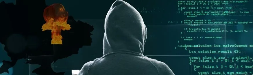 Hooded figure facing screens of code beside a dark map of Ukraine with an explosion