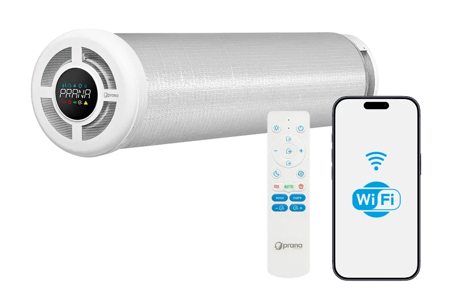 Cylindrical Prana ventilation unit with a round front display, shown beside a white IR remote control and a smartphone displaying a Wi-Fi symbol.